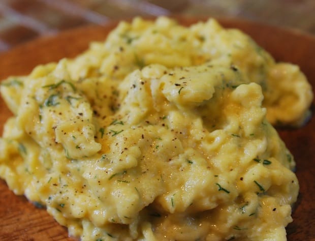 I gently scramble eggs that have mascarpone cheese and dill added to them, 
