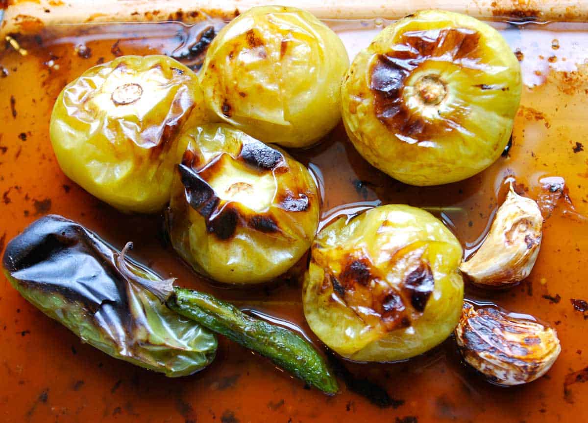 Roasted ingredients for tomatillo salsa verde