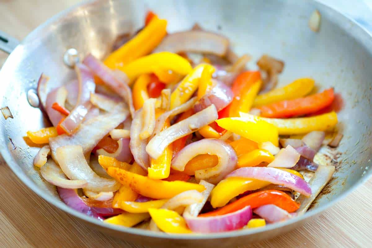 Outrageous Burger Recipe with Egg, Ham and Peppers Sauteed onions and peppers