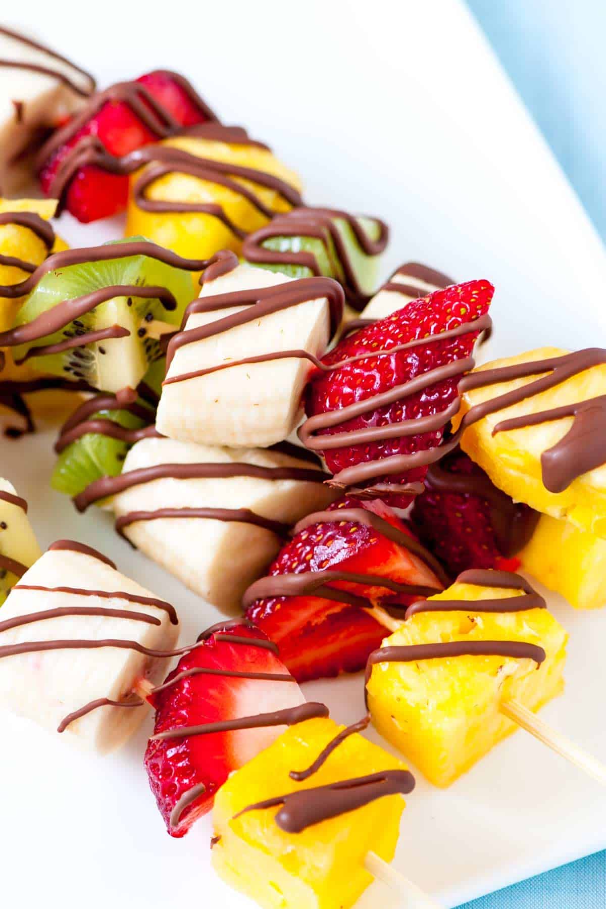 Easy Frozen Fruit Kabobs with Chocolate Drizzle Easy Frozen Fruit Kabobs with Chocolate Drizzle