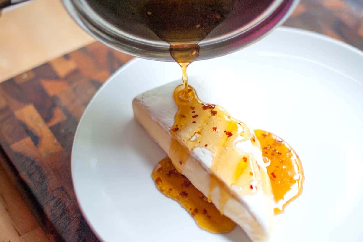 Brie with Warm Honey and Toasted Walnuts Adding the honey