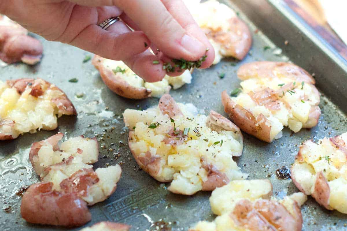 Bacon Roasted Smashed Potatoes Recipe Season with salt, pepper and herbs