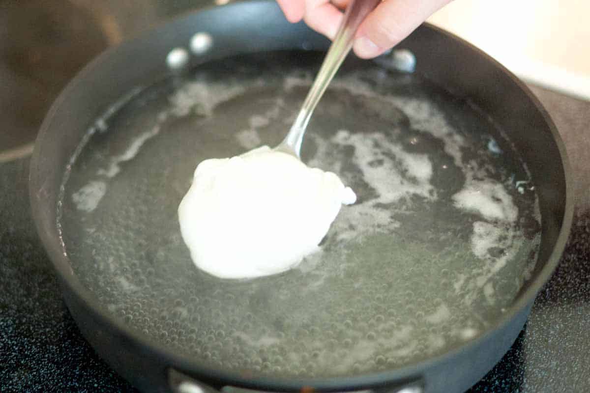 Step 4: Blot poached egg on paper towels