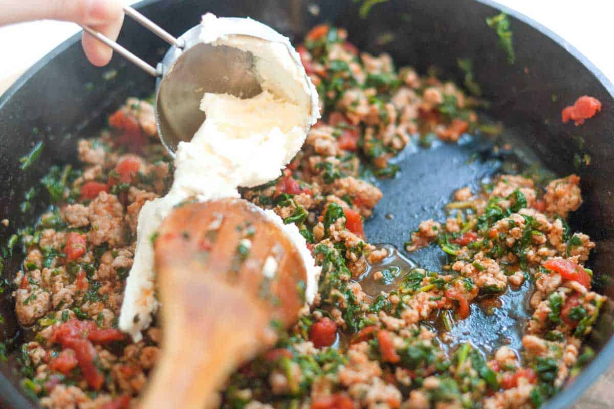 Adding ricotta cheese to the filling to make it creamy.