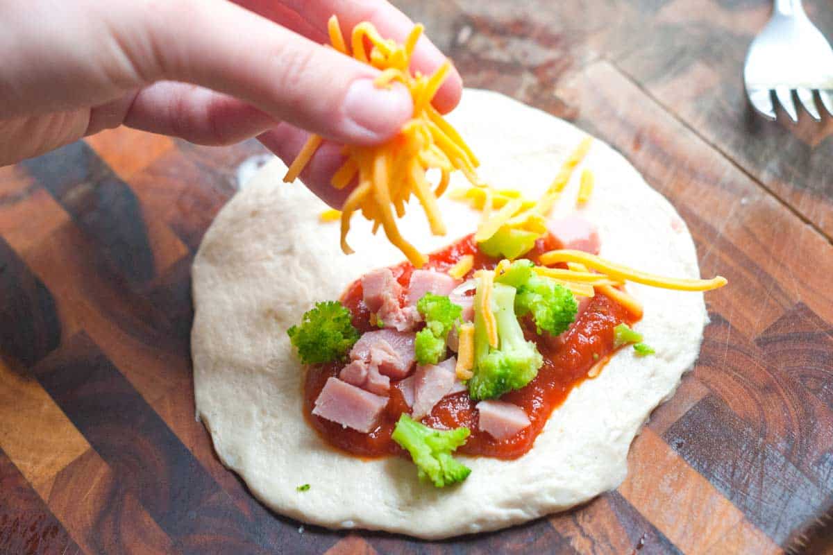 Ham and Broccoli Pizza Pockets Recipe Filling the pockets