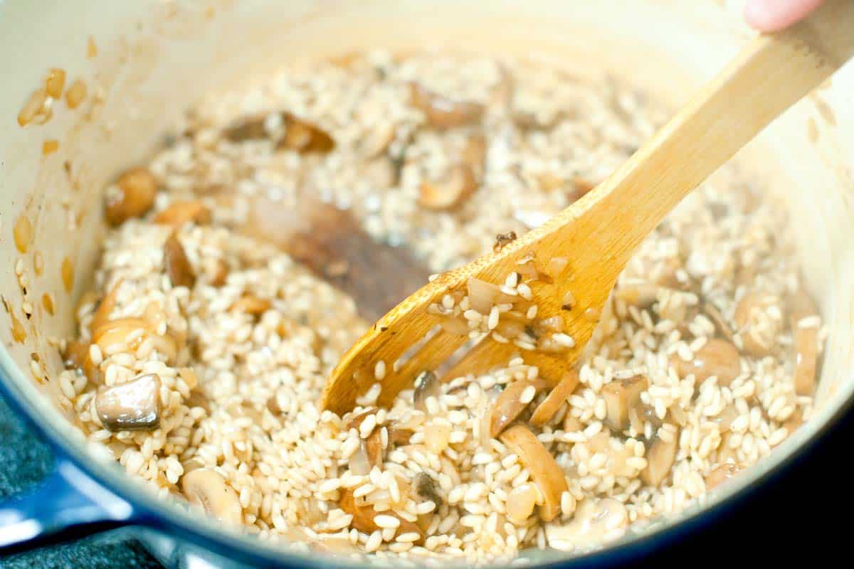 Stirring risotto to make it creamy