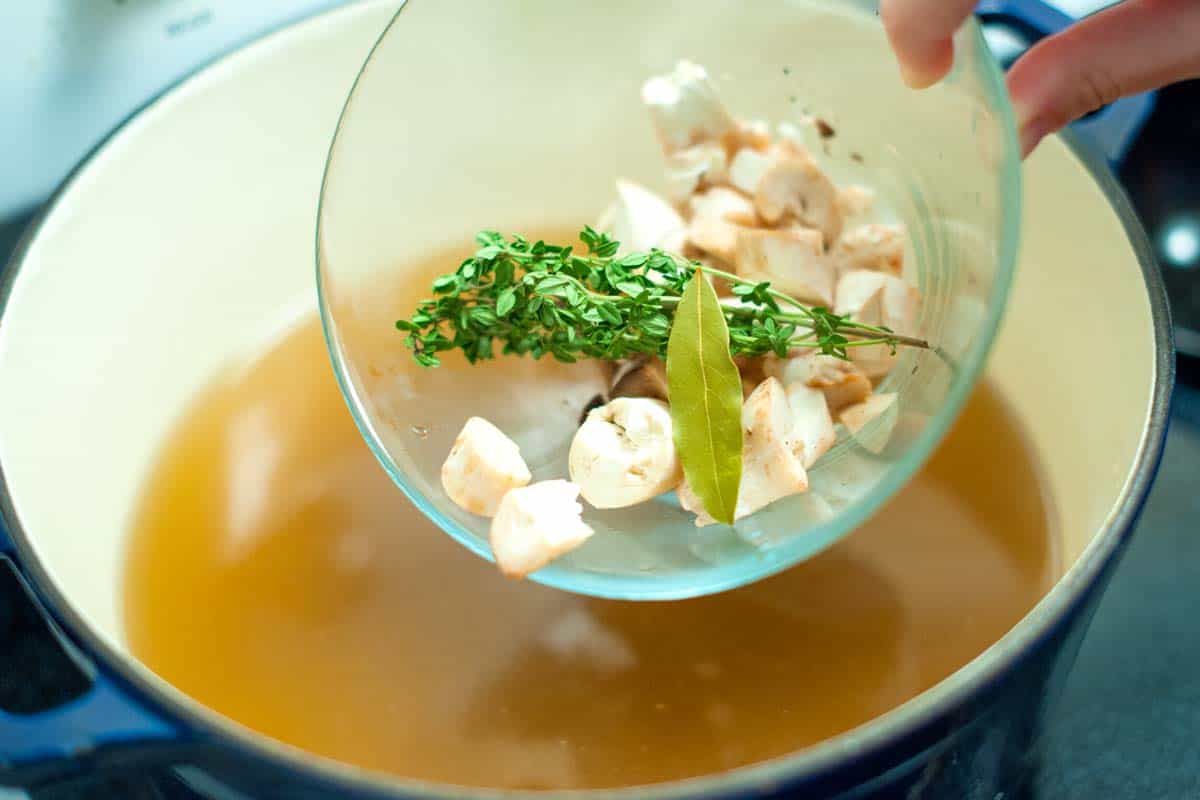 Ultra Creamy Mushroom Risotto Recipe Infusing stock with mushrooms