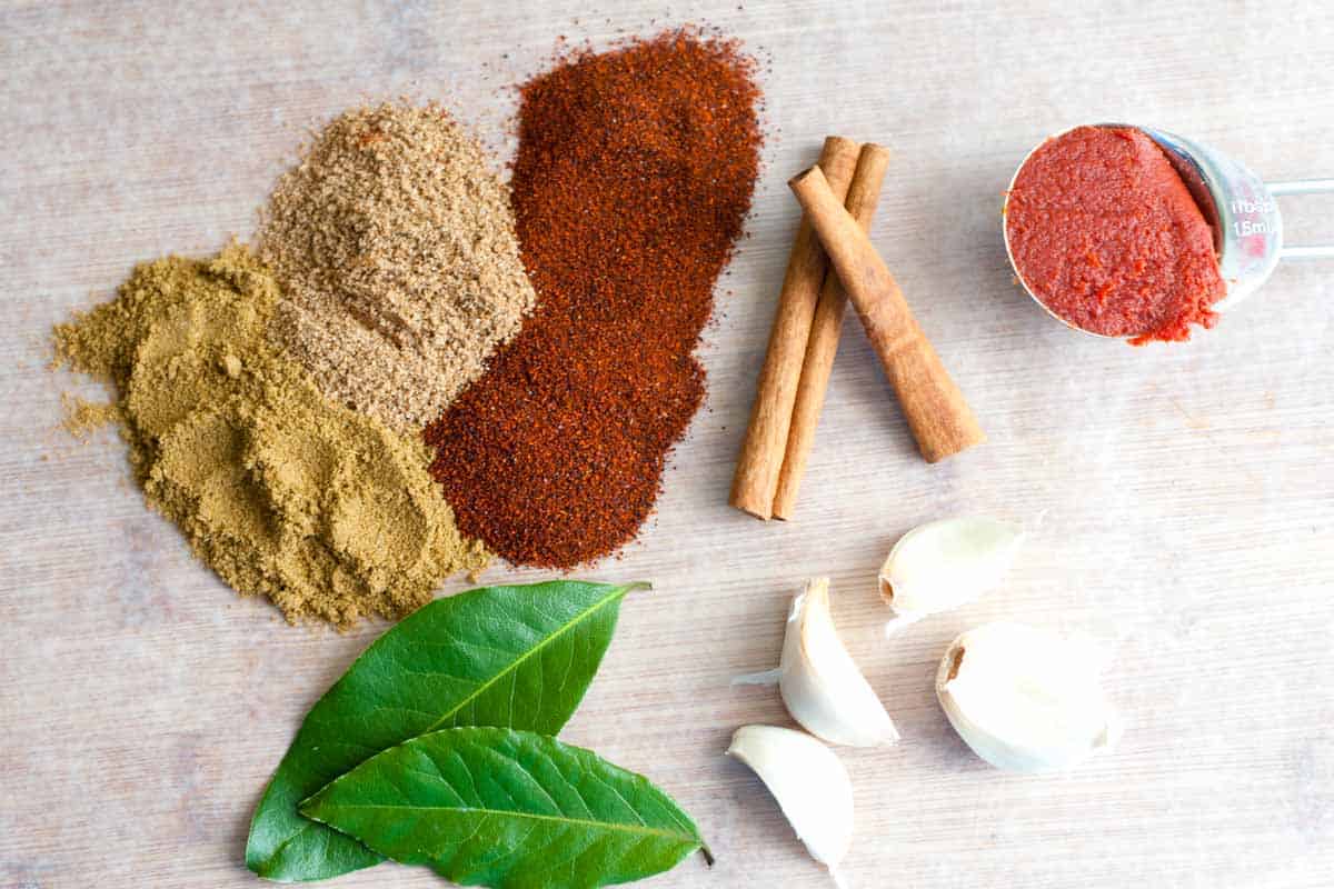 How to Make Irresistible Shredded Beef Tacos Spices, garlic, and tomato paste