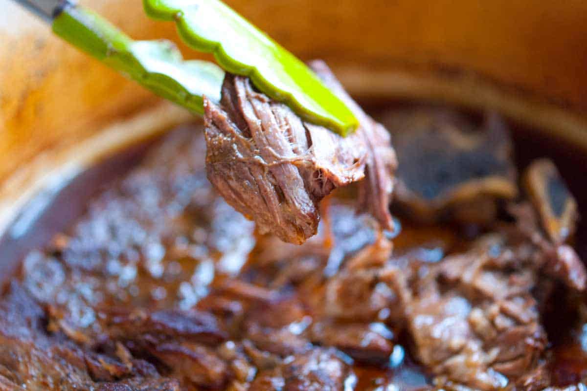 How to Make Irresistible Shredded Beef Tacos How to Make Shredded Beef Tacos: showing super tender shredded beef