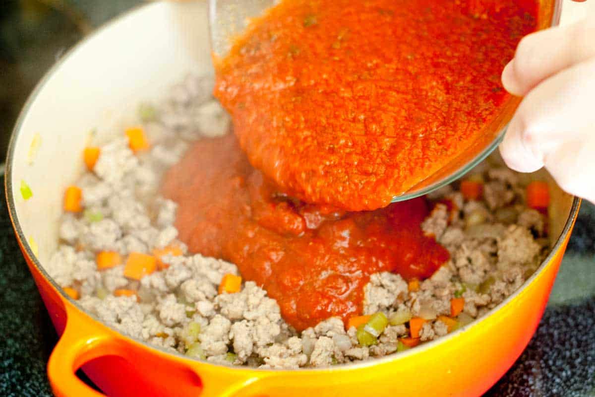 Easy, 30 Minute Chicken Ragu Recipe How to Make Chicken Ragu: Adding the Sauce