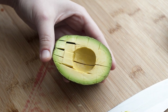 Cutting avocado into cubes