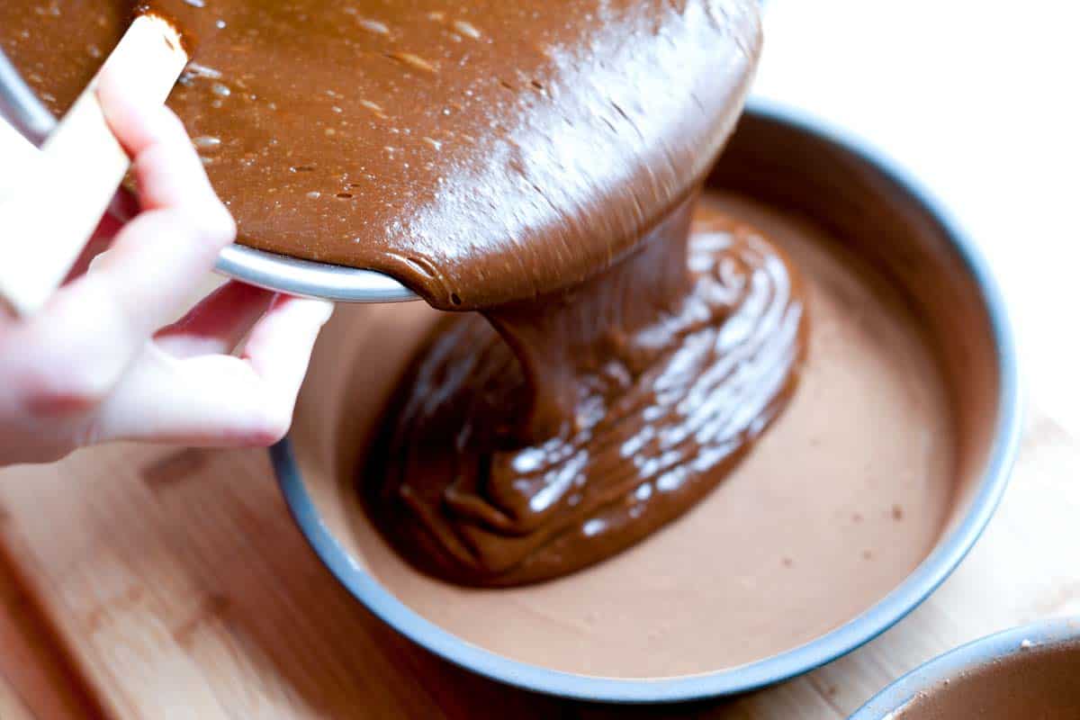 How to Make Chocolate Cake with Guinness How to Make Guinness Chocolate Cake: Adding cake batter to the pan