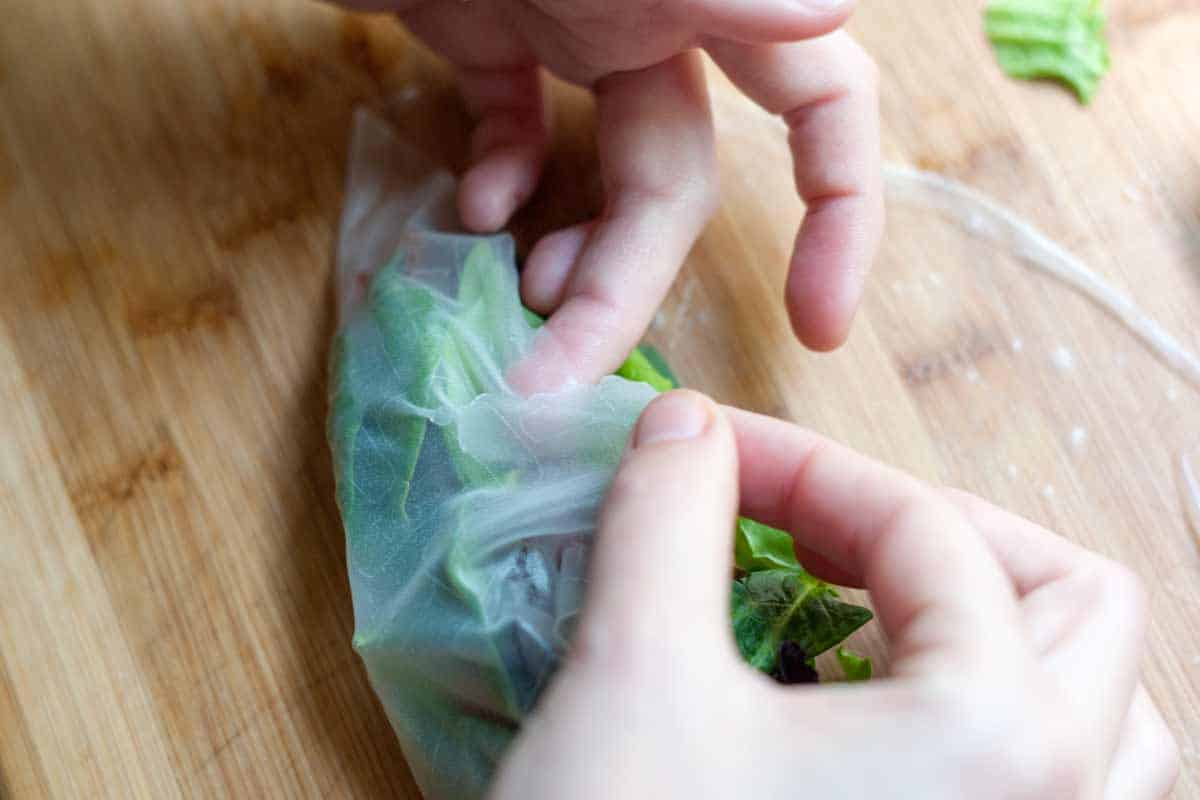 How to Buy and Use Rice Paper Wrappers How to Wrap Rice Paper Wrappers: Don't worry if it tears when rolling