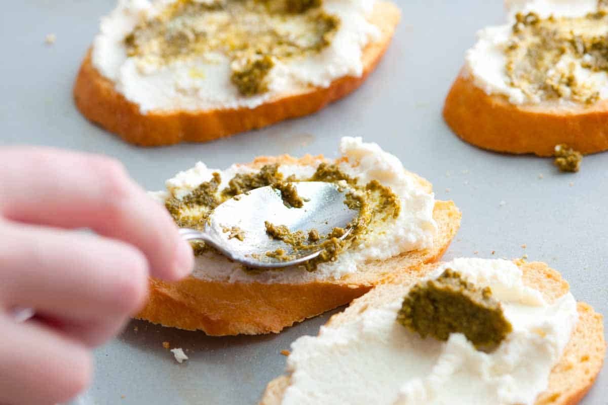 Making Crostini -- Adding the pesto