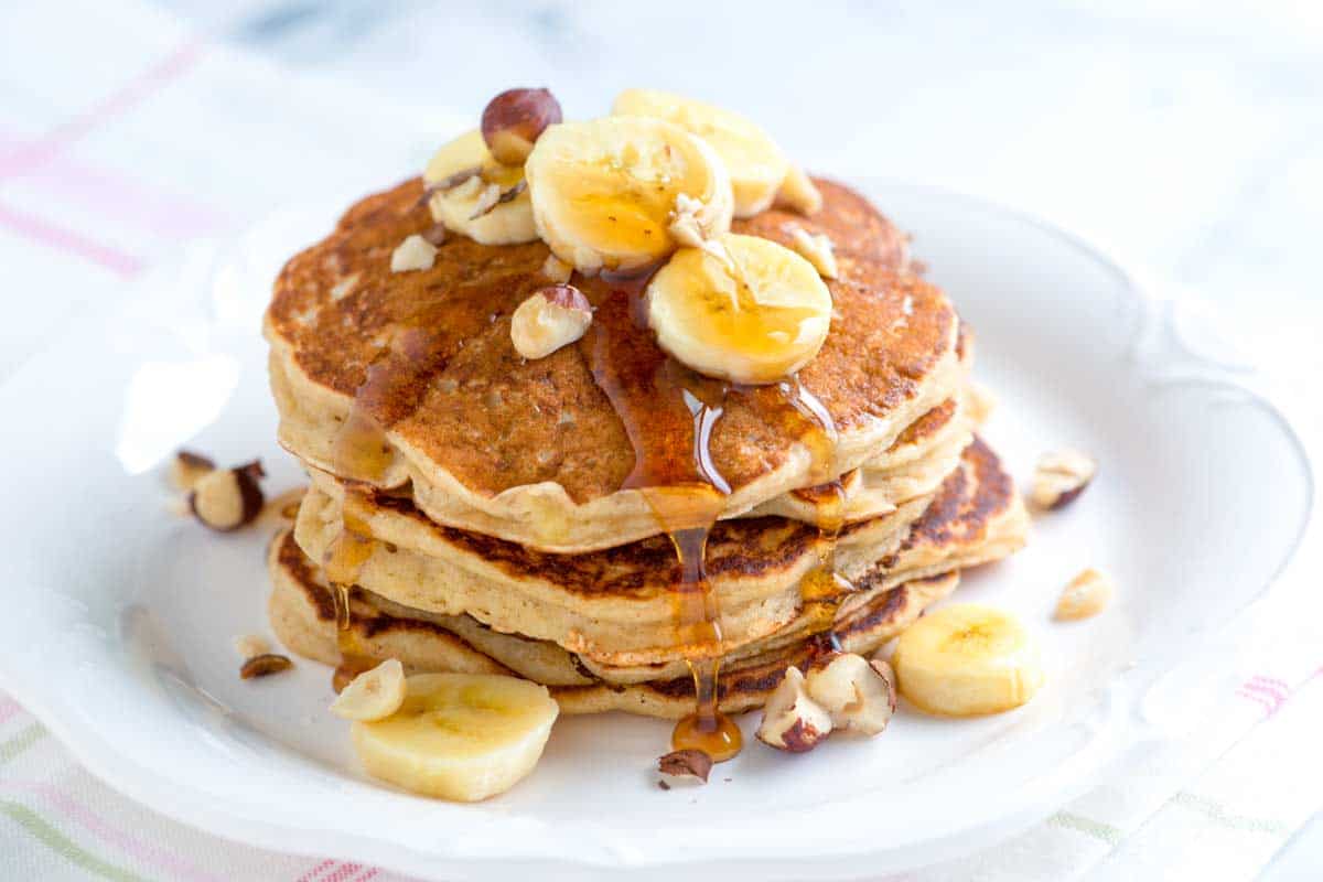 Our easy banana pancakes with buttermilk and warm spices takes less than 30 minutes and make even the pickiest eaters happy