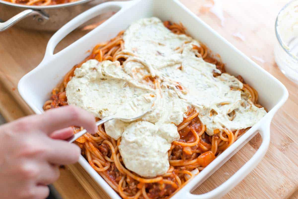 How to Make Baked Spaghetti: Add a creamy pesto layer to the middle