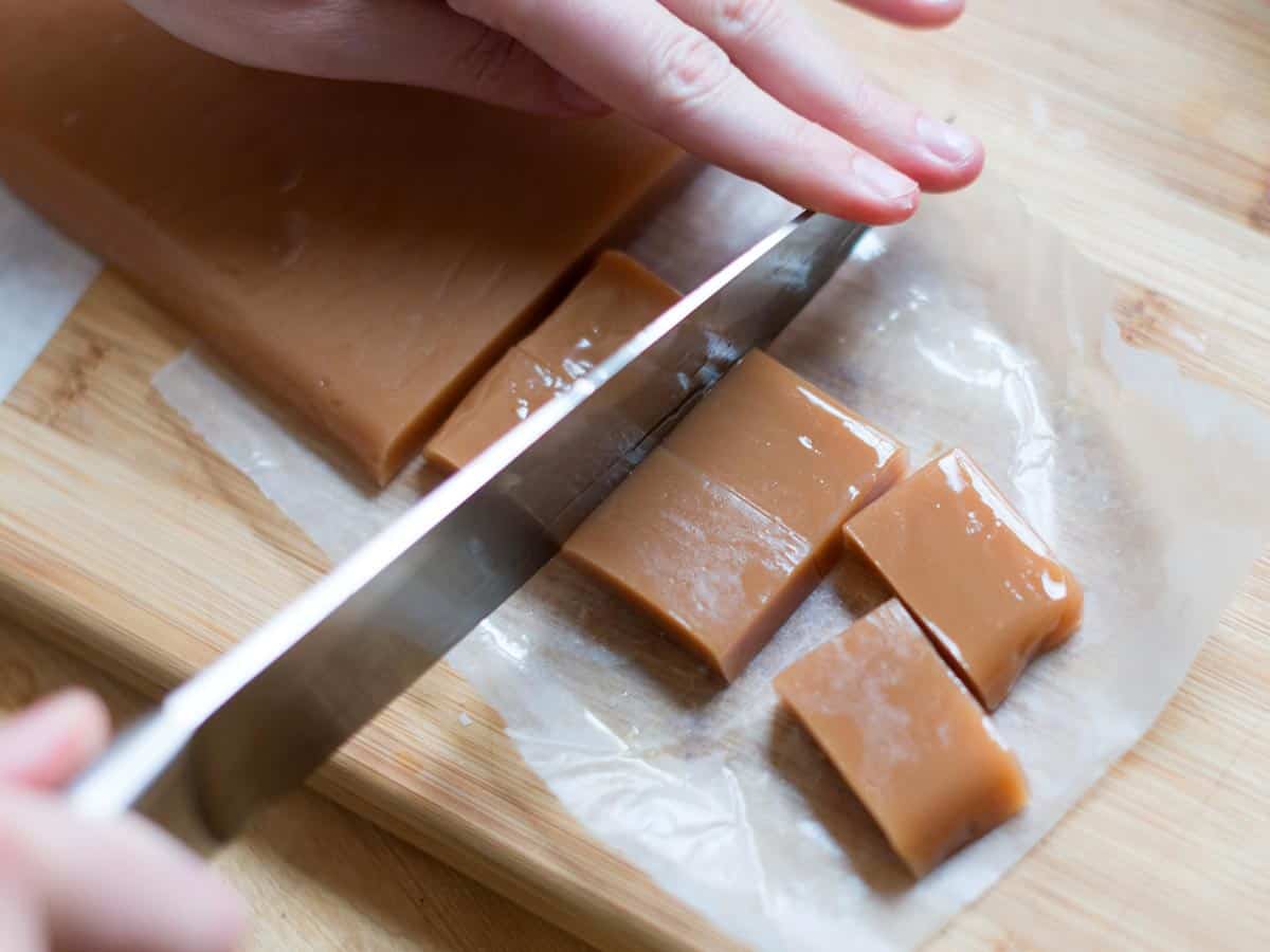 Chocolate Covered Caramels Recipe How to Make Chocolate Covered Caramels: Cutting the homemade caramel