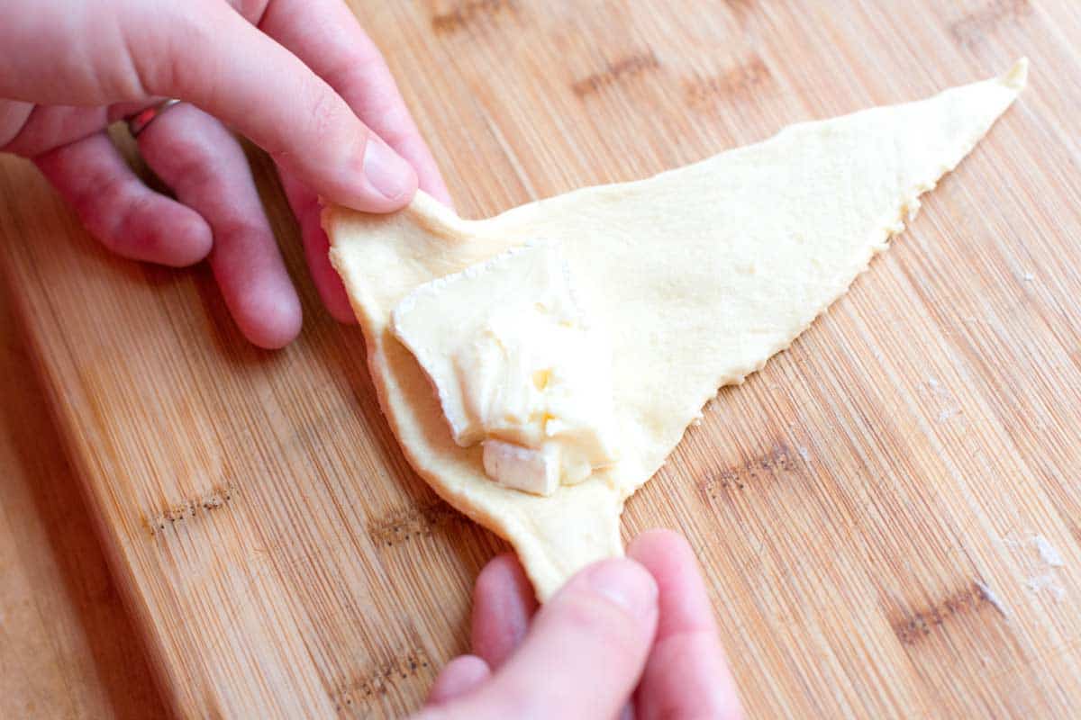 Mini Baked Brie Roll Ups How to Make Baked Brie Crescent Rolls: Rolling up the cheese