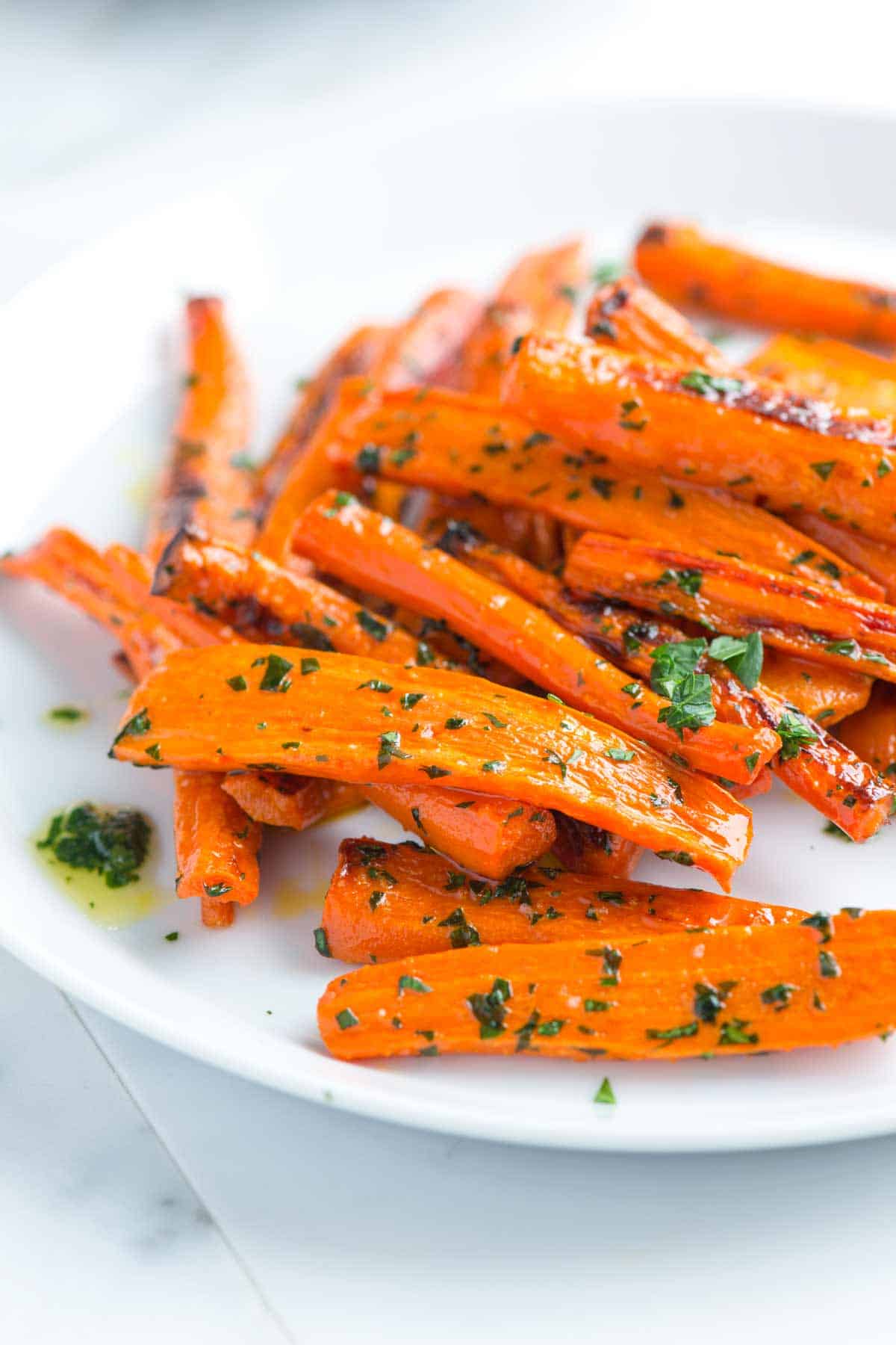 Showing my favorite carrots recipe - Garlic Butter Roasted Carrots 