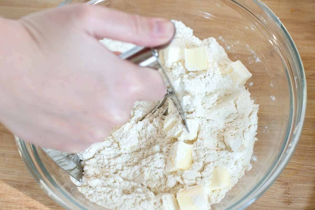Cranberry Scones Recipe How to Make Cranberry Orange Scones: Cutting butter into flour