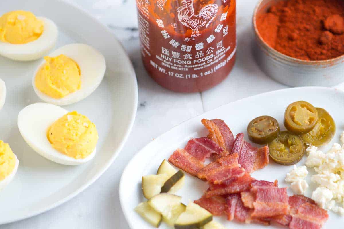 Deviled eggs variations including spicy, bacon, and paprika.