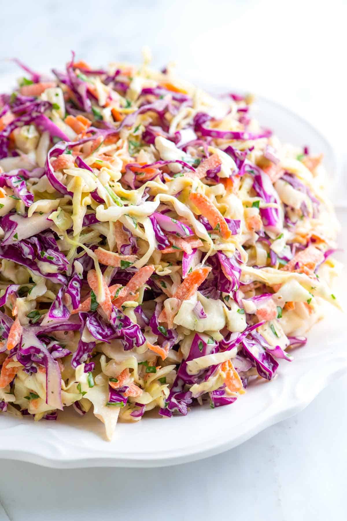 The best homemade coleslaw with red and green cabbage and a creamy coleslaw dressing.