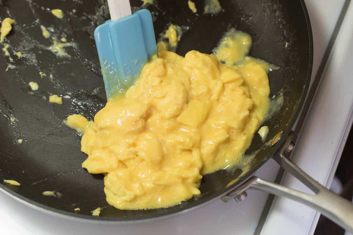 Egg scramble looks softly set and slightly runny in places