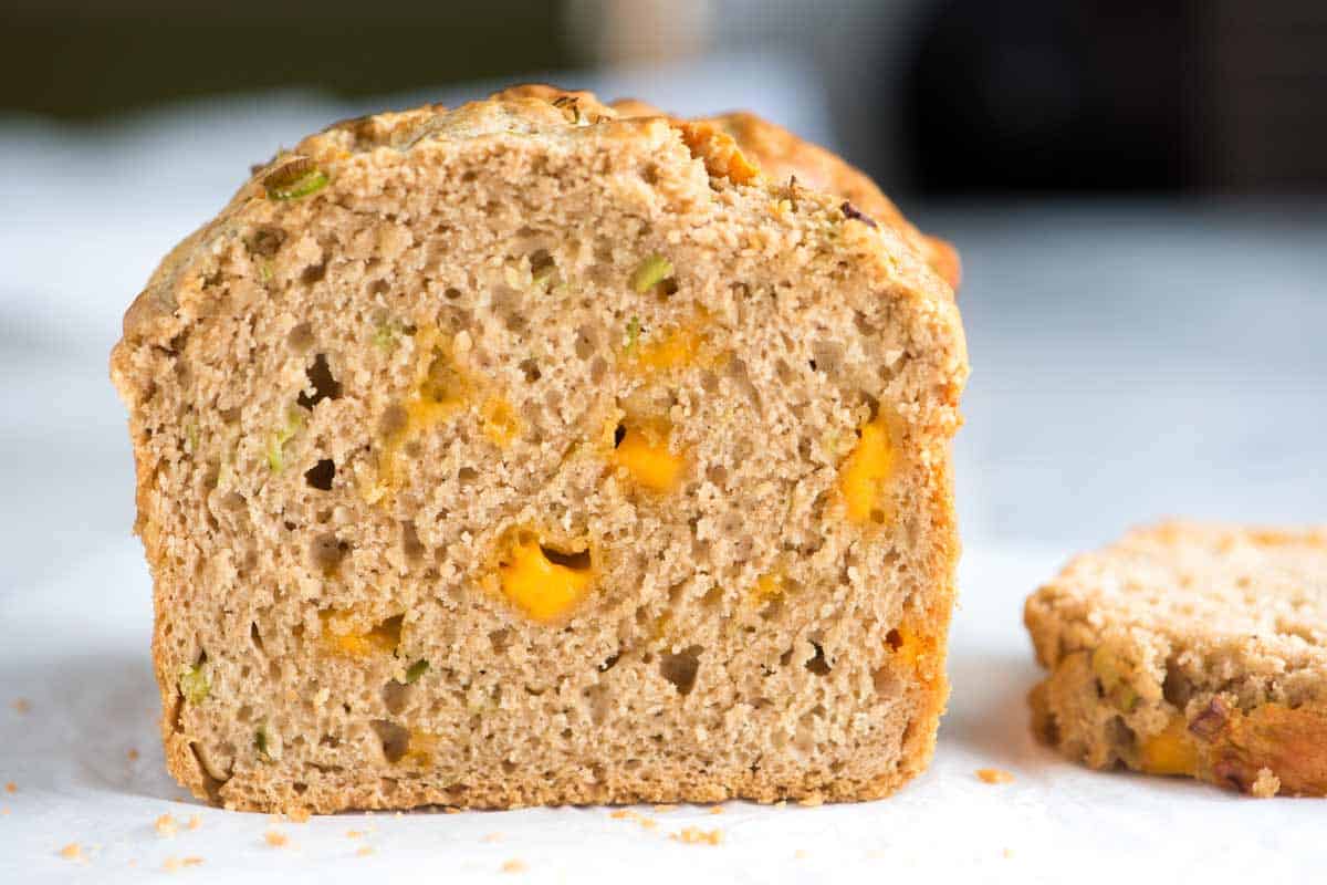 A photo showing what a slice of homemade beer bread made with stout beer and cheese looks like.