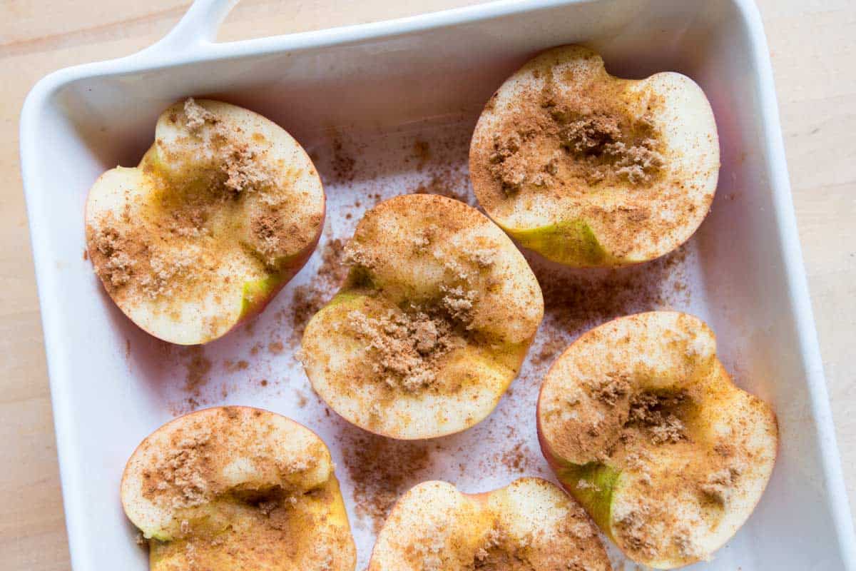 Scatter a little brown sugar and cinnamon over the apples before baking.