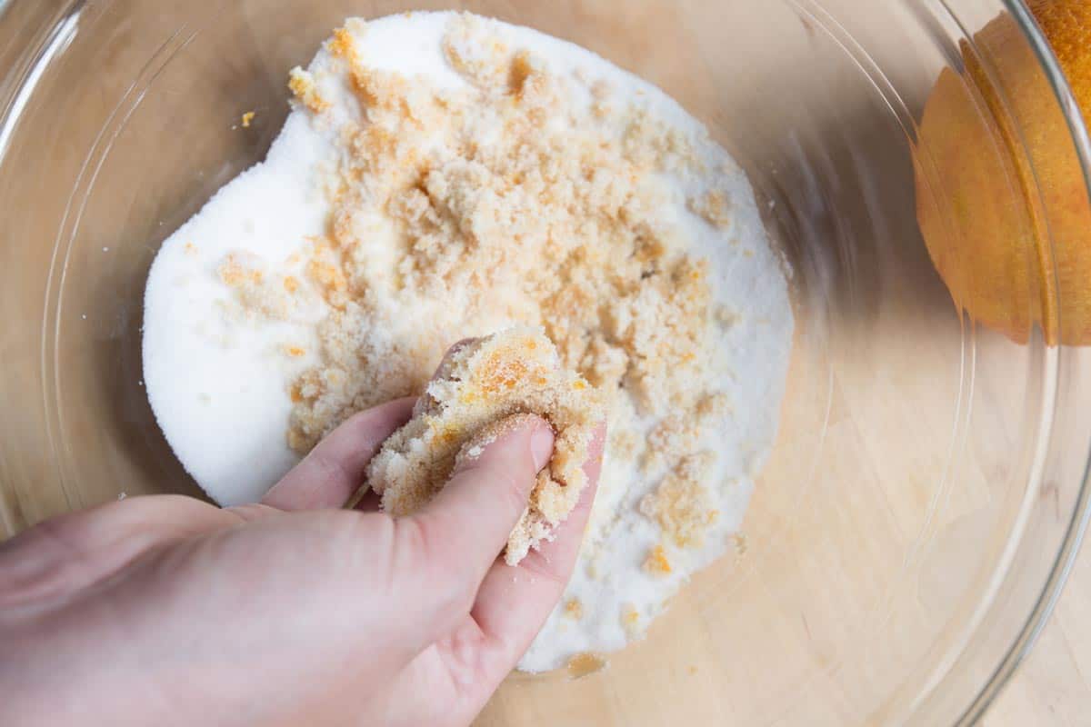 How to Make Pumpkin Bread: Rub orange zest and vanilla extract into the sugar for extra flavor