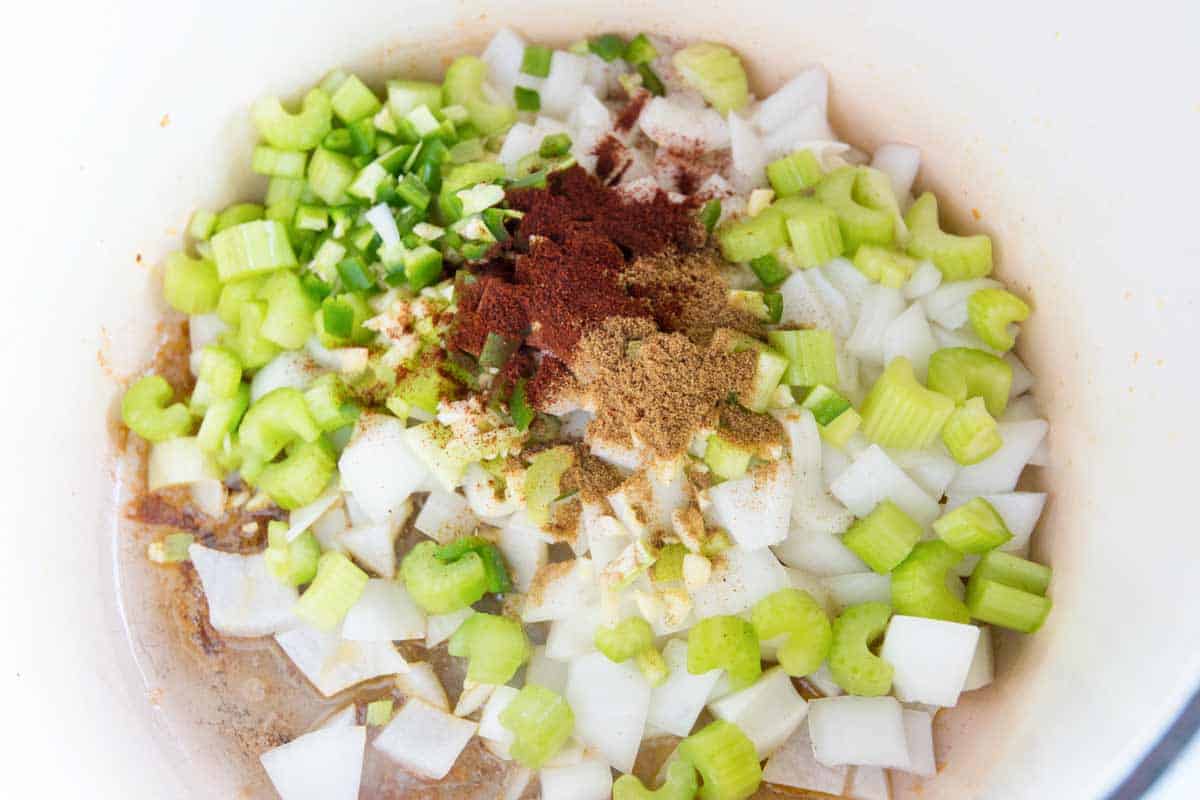 How to Make Chicken Tortilla Soup: Cooking the veggies and spices.
