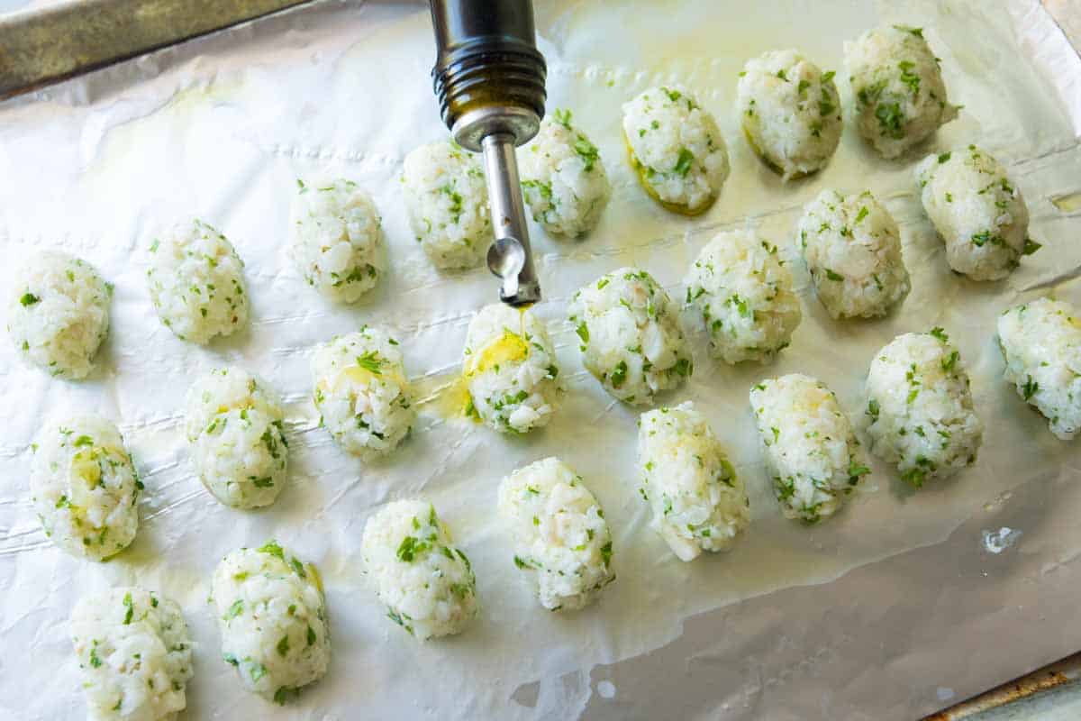 Shaping the tater tots before baking.