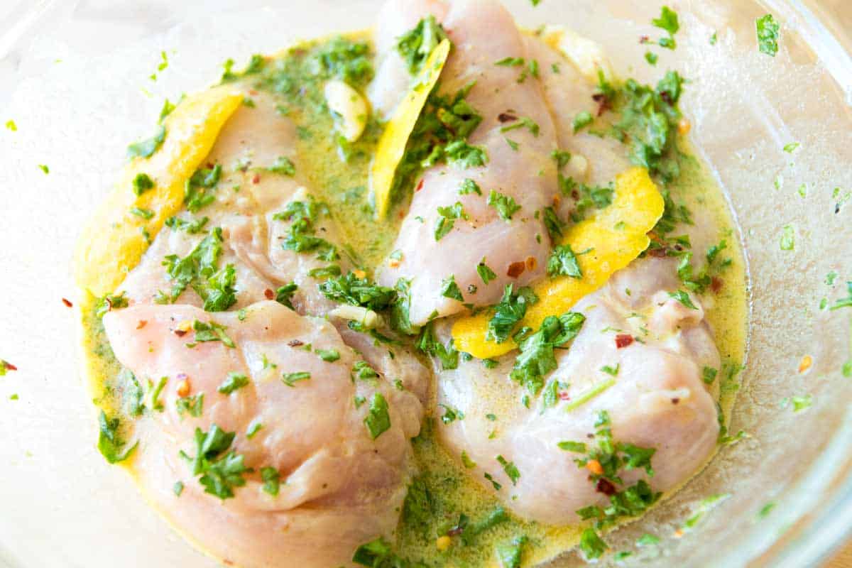 How to Make Lemon Baked Chicken Breasts: Marinating the chicken in a lemon marinade