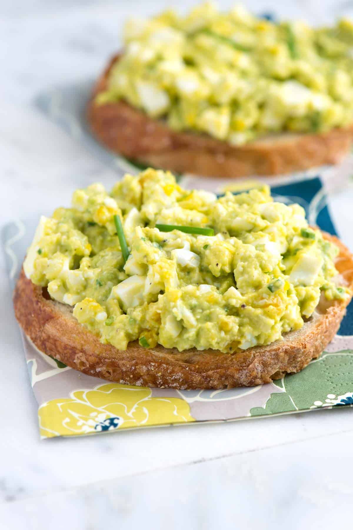 Open-faced avocado egg salad sandwich