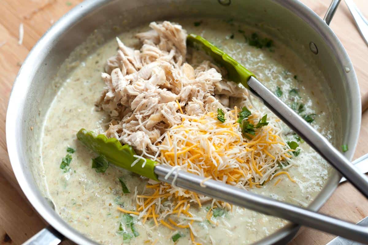 Creamy green enchilada sauce with chicken and cheese