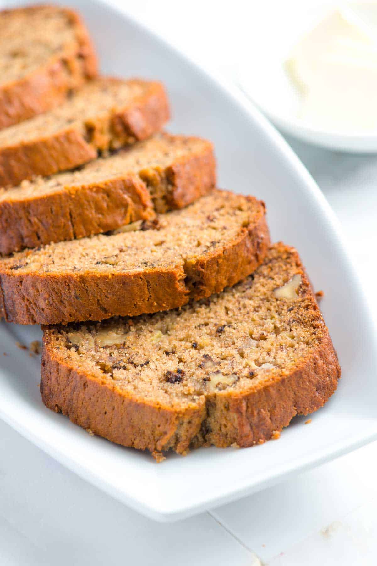 Slices of banana bread with walnuts and a moist tender crumb