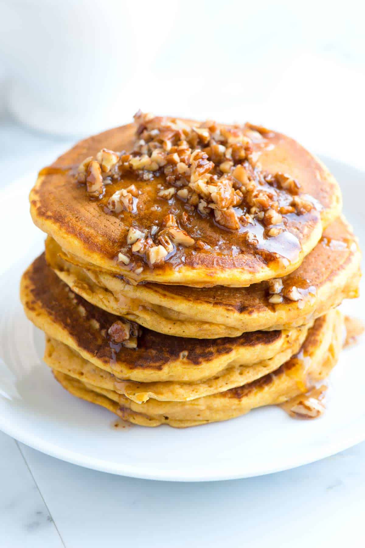 Fluffy Pumpkin Pancakes with Butter Pecan Syrup How to Make Pumpkin Pancakes with Butter Pecan Syrup