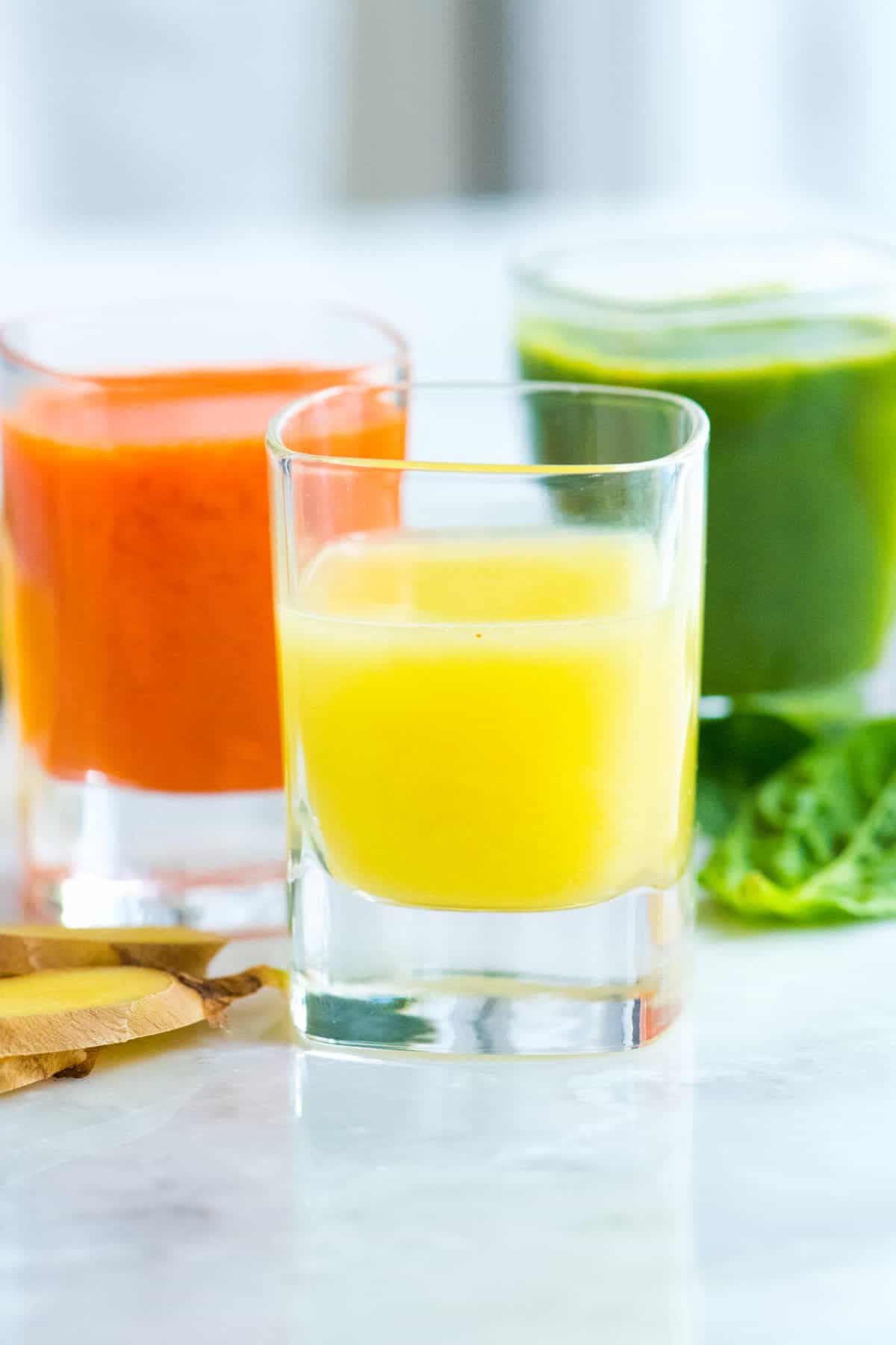 Three Ginger Power Shots including Lemon Ginger, Carrot Ginger and a Green Apple Ginger Shot