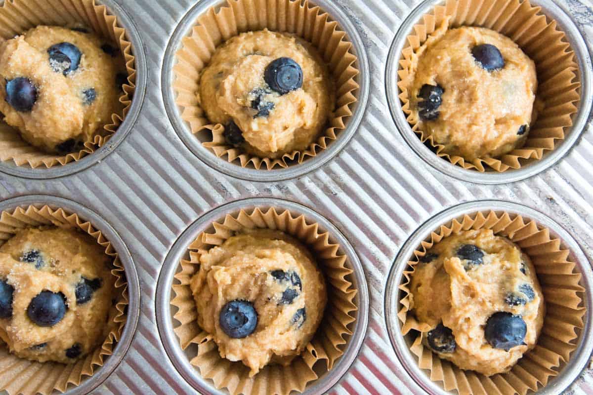 How to Make Banana Blueberry Muffins: batter in muffin cups ready to bake