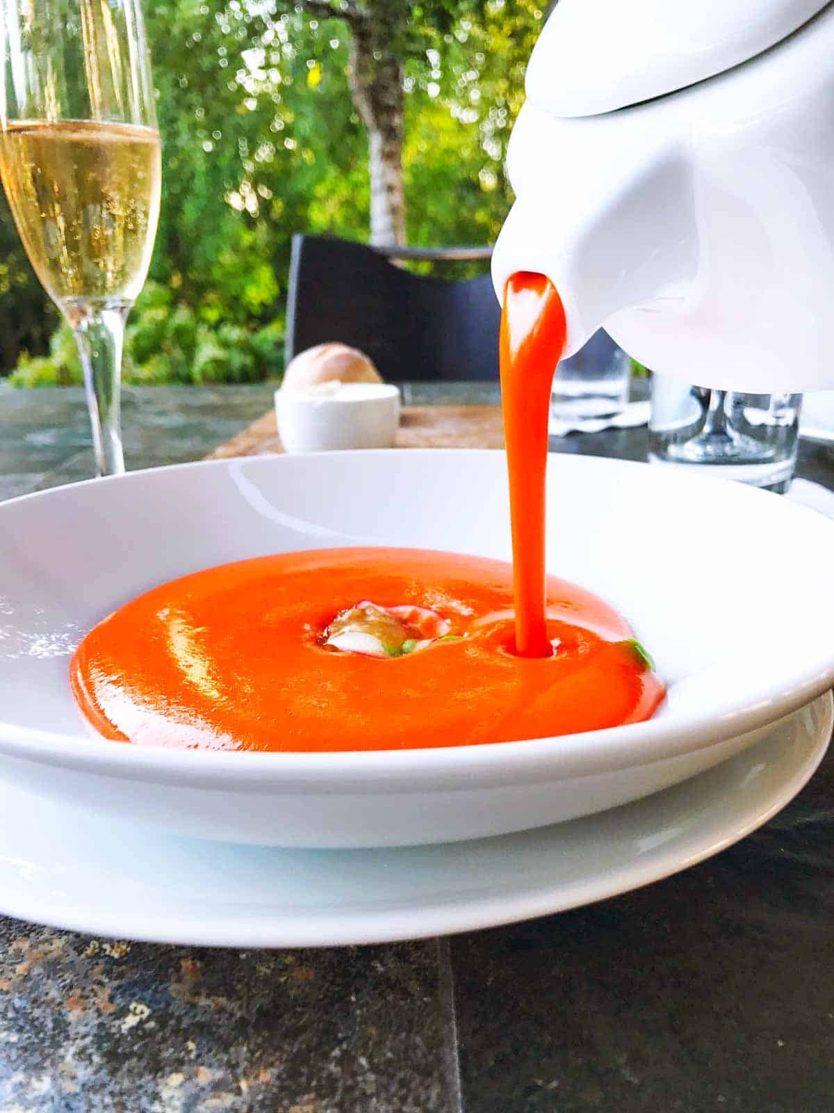 Chilled carrot soup with English peas and garden radish from the vegetarian tasting menu.