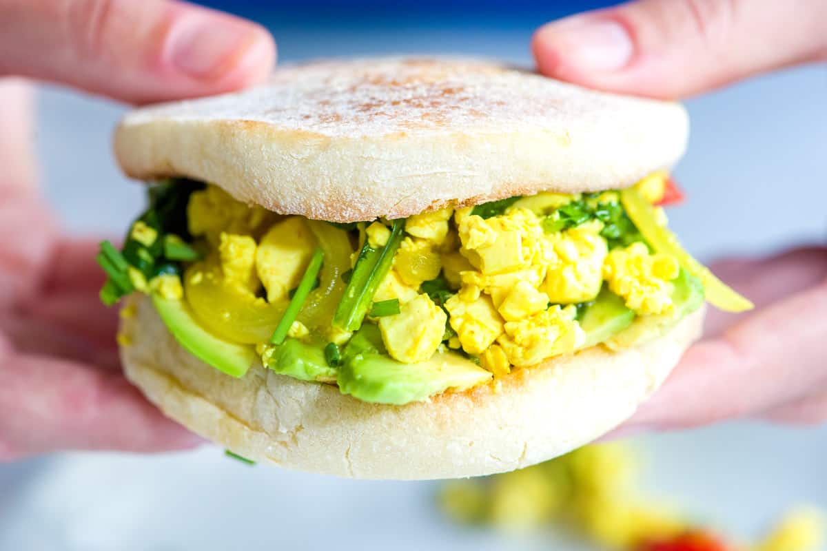 Ultra-Satisfying Vegetable Tofu Scramble Recipe Ultra-Satisfying Vegetable Tofu Scramble on an English Muffin