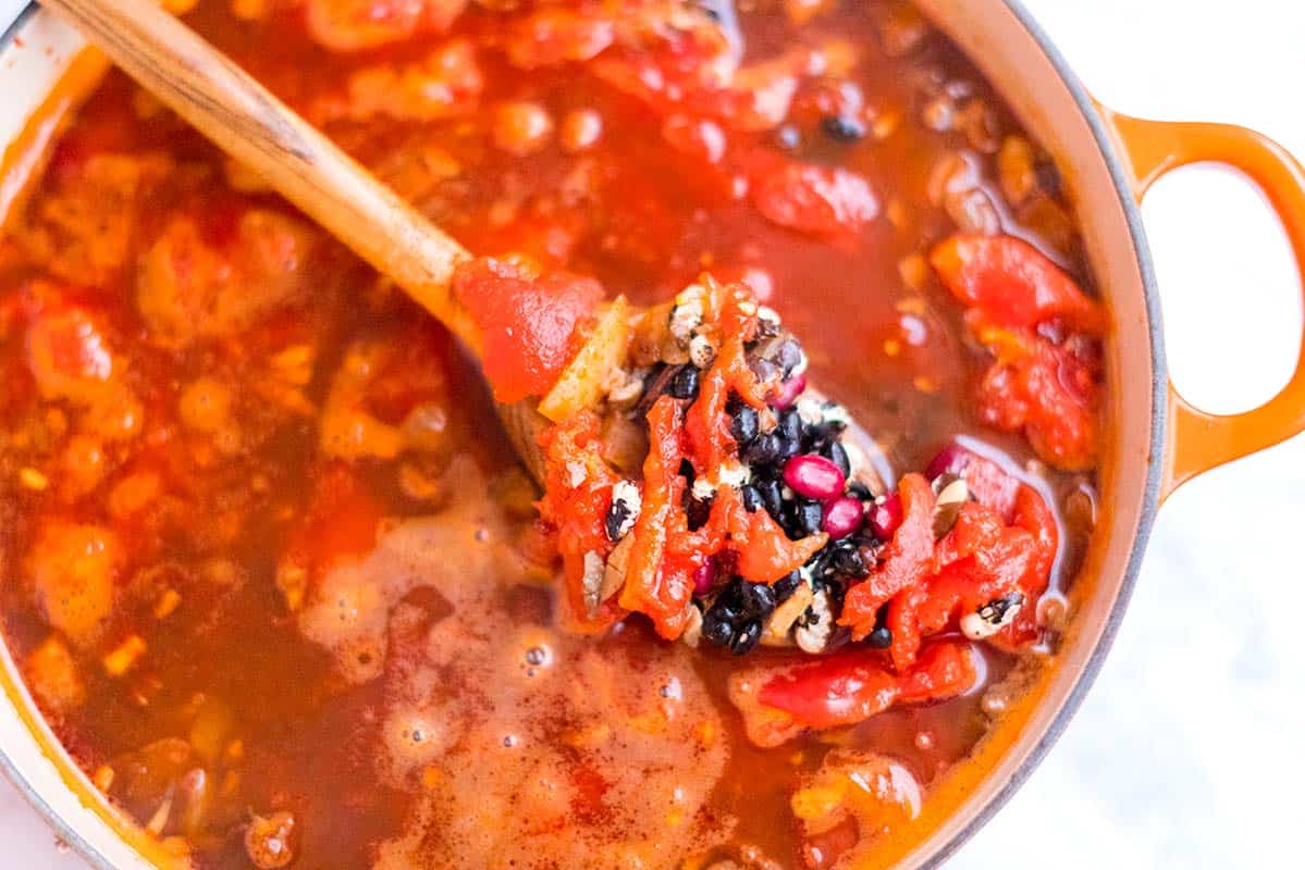 Cooking bean chili on the stove.