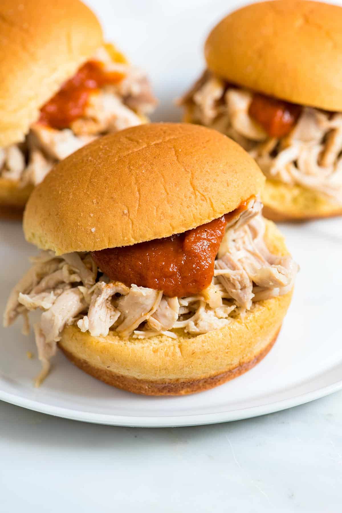 How to make tender and flavorful shredded chicken using a slow cooker. Try this easy recipe and use for sandwiches, tacos and more.