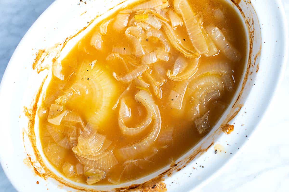 How To Make Gravy With Pan Drippings -- Here's the dish used when I roasted a chicken. The pan drippings at the bottom are ultra-flavorful so I use them to make  gravy.