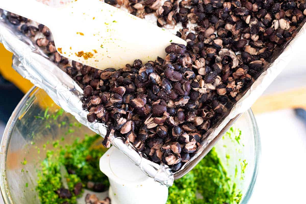 Roast the beans for about 15 minutes so they split open and dry out a bit.