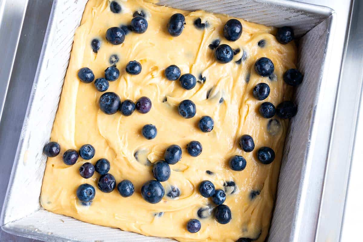 How to Make Lemon Blueberry Cake: Adding the cake batter to baking pan