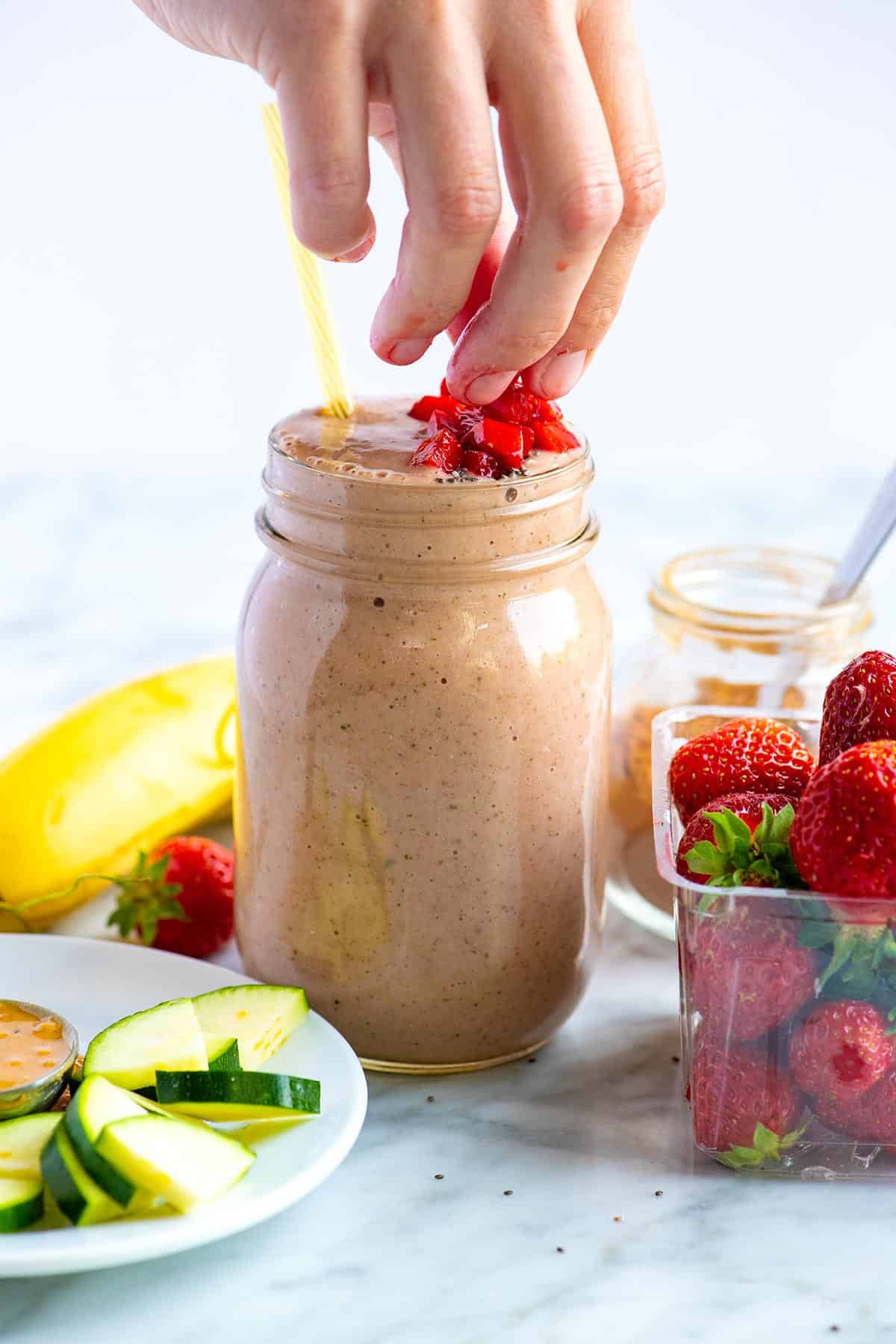 With 6 grams of protein and 7 grams of fiber, this utterly delicious strawberry banana smoothie will keep you full and energized for what's to come. strawberry banana smoothie