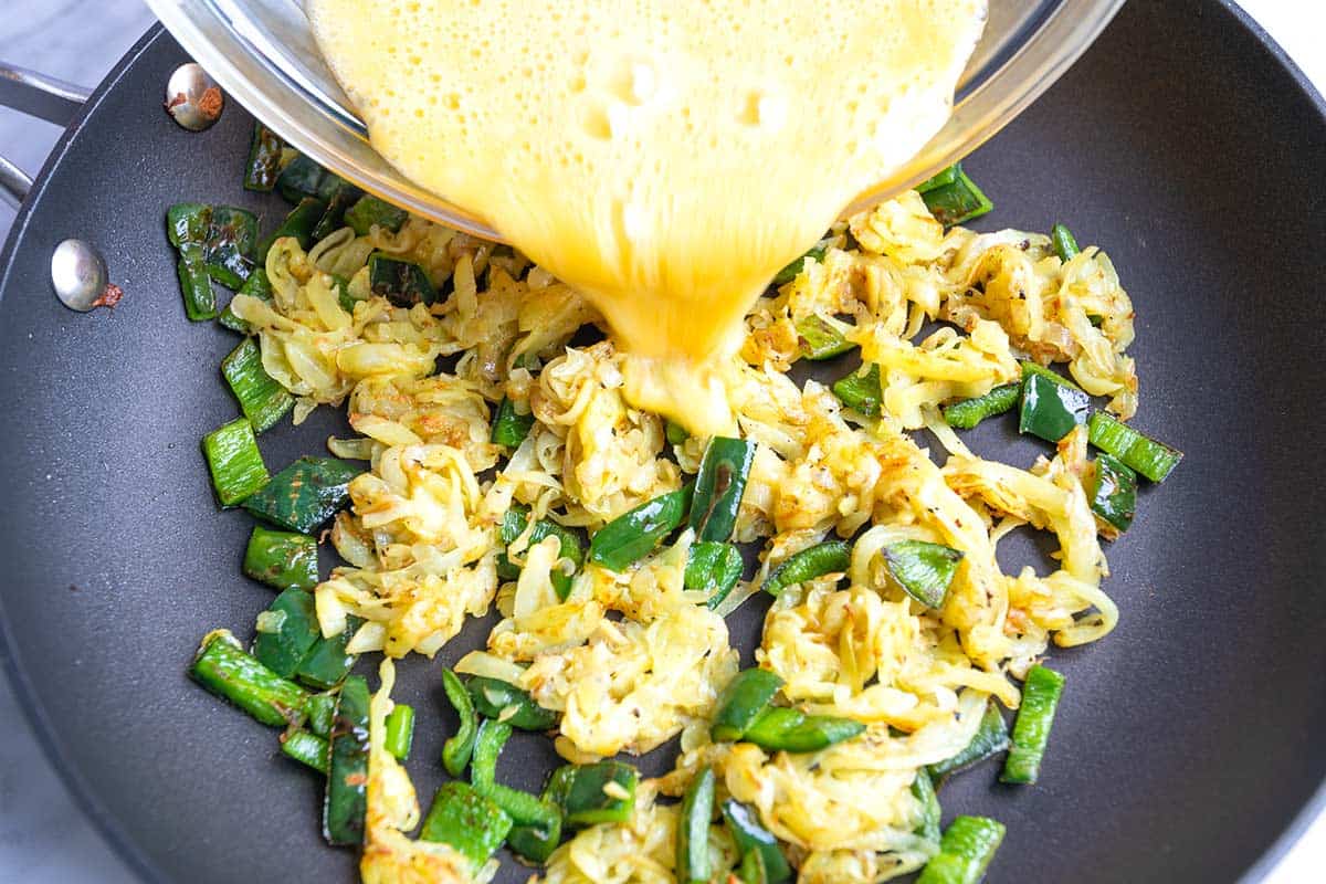 How to Make Breakfast Tacos: Cooking the eggs with potatoes