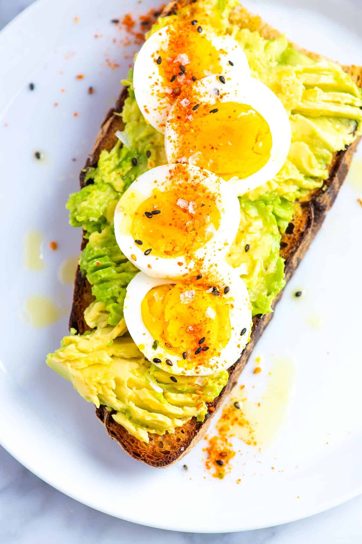 Delicious avocado toast recipe with egg and flaky salt, perfect for breakfast