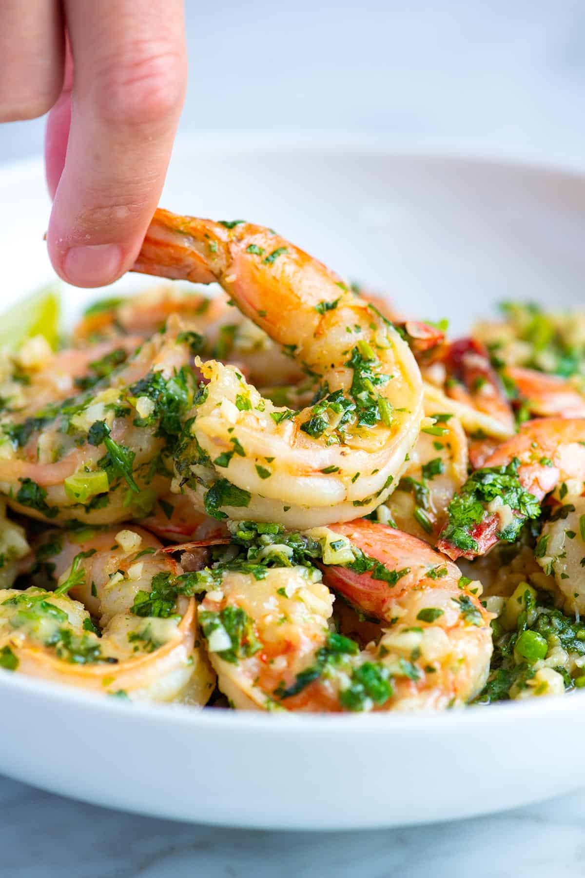 These garlicky, buttery shrimp come together in under 20 minutes. Inspired by traditional shrimp scampi, we swap lemon for lime and parsley for cilantro. 